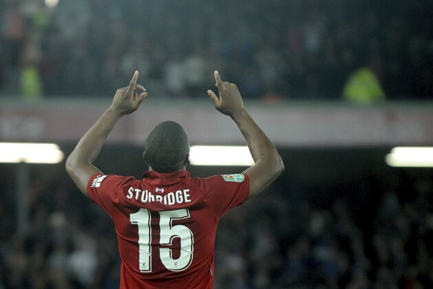 Liverpool's Daniel Sturridge celebrates after scoring his side's opening goal during the English League Cup soccer match between Liverpool and Chelsea at Anfield stadium in Liverpool, England, Wednesday, Sept. 26, 2018. (AP Photo/Rui Vieira)