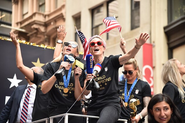 NEW YORK, NEW YORK - JULY 10: Ali Krieger and Megan Rapinoe at The U.S. Women's National Soccer Team Victory Parade and City Hall Ceremony on July 10, 2019 in New York City. (Photo by Theo Wargo/Getty Images)