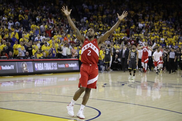 Toronto Raptors forward Kawhi Leonard celebrates after the Raptors defeat the Golden State Warriors 114-110 in Game 6 of basketball's NBA Finals in Oakland, Calif., Thursday, June 13, 2019. (AP Photo/Ben Margot)