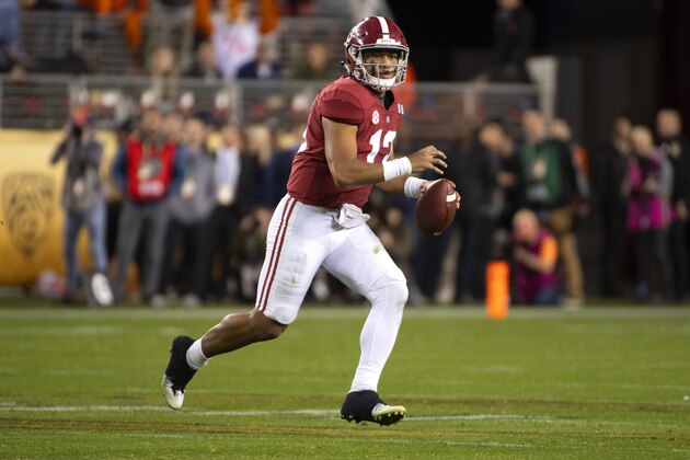 SANTA CLARA, CA - JANUARY 07: Tua Tagovailoa #13 of the Alabama Crimson Tide makes a pass against the Clemson Tigers during the College Football Playoff National Championship held at Levi's Stadium on January 7, 2019 in Santa Clara, California. The Clemson Tigers defeated the Alabama Crimson Tide 44-16. (Photo by Jamie Schwaberow/Getty Images)