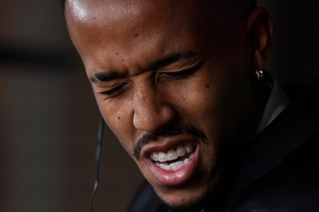 Brazil's defender Eder Militao gestures during a press conference after his official presentation as Real Madrid new player at the Santiago Bernabeu stadium in Madrid on July 10, 2019. (Photo by OSCAR DEL POZO / AFP)        (Photo credit should read OSCAR DEL POZO/AFP/Getty Images)