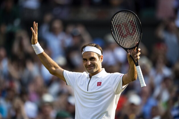 LONDON, ENGLAND - JULY 10: Roger Federer of Switzerland celebrates  his victory over Kei Nishikori of Japan during Day 9 of The Championships - Wimbledon 2019 at All England Lawn Tennis and Croquet Club on July 10, 2019 in London, England. (Photo by TPN/Getty Images)