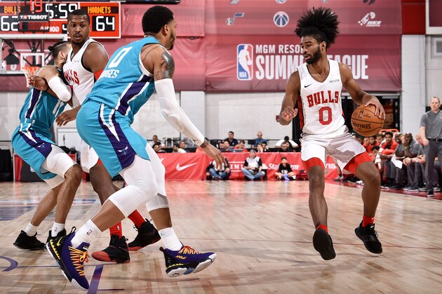 LAS VEGAS, NV - JULY 10:  Coby White #0 of the Chicago Bulls handles the ball against the Charlotte Hornets on July 10, 2019 at the Cox Pavilion in Las Vegas, Nevada. NOTE TO USER: User expressly acknowledges and agrees that, by downloading and/or using this photograph, user is consenting to the terms and conditions of the Getty Images License Agreement. Mandatory Copyright Notice: Copyright 2019 NBAE (Photo by David Dow/NBAE via Getty Images)