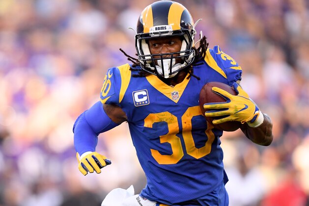 LOS ANGELES, CA - SEPTEMBER 27:  Todd Gurley #30 of the Los Angeles Rams carries the ball against the Minnesota Vikings at Los Angeles Memorial Coliseum on September 27, 2018 in Los Angeles, California.  (Photo by Harry How/Getty Images)