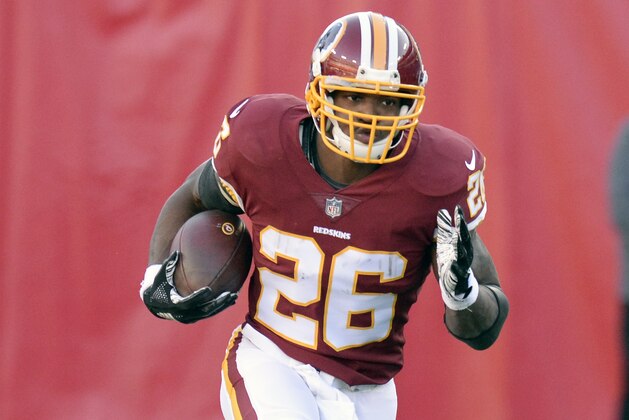 Washington Redskins running back Adrian Peterson warms up before an NFL football game against the Tennessee Titans Saturday, Dec. 22, 2018, in Nashville, Tenn. (AP Photo/Mark Zaleski)