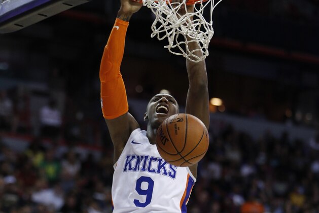 New York Knicks' RJ Barrett dunks against the Los Angeles Lakers during the first half of an NBA summer league basketball game, Wednesday, July 10, 2019, in Las Vegas. (AP Photo/John Locher)