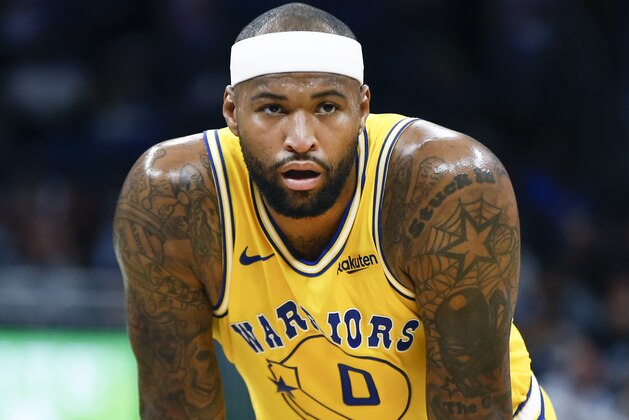 Golden State Warriors center DeMarcus Cousins waits on the ball to come into play during the first quarter of an NBA basketball game against the Orlando Magic in Orlando, Fla., on Thursday, Feb. 28, 2019. (AP Photo/Reinhold Matay)
