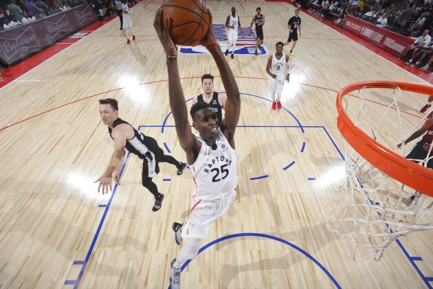 LAS VEGAS, NV - JULY 8: Chris Boucher #25 of the Toronto Raptors dunks the ball against the San Antonio Spurs on July 8, 2019 at the Cox Pavilion in Las Vegas, Nevada. NOTE TO USER: User expressly acknowledges and agrees that, by downloading and/or using this photograph, user is consenting to the terms and conditions of the Getty Images License Agreement. Mandatory Copyright Notice: Copyright 2019 NBAE (Photo by David Dow/NBAE via Getty Images)