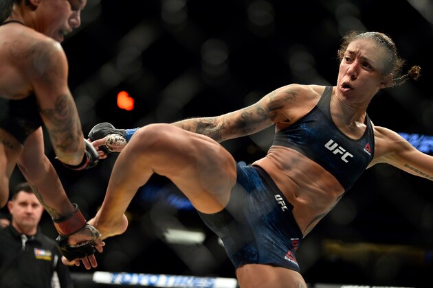 DENVER, CO - NOVEMBER 10:  (R-L) Germaine de Randamie of The Netherlands kicks Raquel Pennington in their women's bantamweight bout during the UFC Fight Night event inside Pepsi Center on November 10, 2018 in Denver, Colorado. (Photo by Chris Unger/Zuffa LLC/Zuffa LLC via Getty Images)