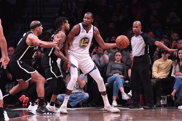 NEW YORK, NY - OCTOBER 28: Kevin Durant #35 of the Golden State Warriors handles the ball against D'Angelo Russell #1 of the Brooklyn Nets during the game at Barclays Center on October 28, 2018 in the Brooklyn borough of New York City. NOTE TO USER: User expressly acknowledges and agrees that, by downloading and or using this photograph, User is consenting to the terms and conditions of the Getty Images License Agreement. (Photo by Matteo Marchi/Getty Images)