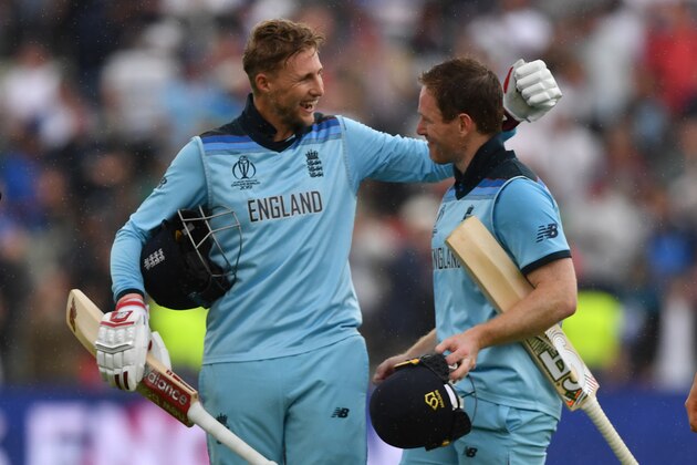 England's captain Eoin Morgan (R) and England's Joe Root celebrate victory at close of play during the 2019 Cricket World Cup second semi-final between England and Australia at Edgbaston in Birmingham, central England,  on July 11, 2019. - England beat Australia by 8 wickets. (Photo by Paul ELLIS / AFP) / RESTRICTED TO EDITORIAL USE        (Photo credit should read PAUL ELLIS/AFP/Getty Images)