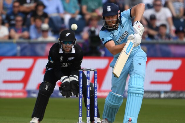 England's Jonny Bairstow (R) is watched by New Zealand's wicketkeeper Tom Latham as he plays a shot  during the 2019 Cricket World Cup group stage match between England and New Zealand at the Riverside Ground, in Chester-le-Street, northeast England, on July 3, 2019. (Photo by Paul ELLIS / AFP) / RESTRICTED TO EDITORIAL USE        (Photo credit should read PAUL ELLIS/AFP/Getty Images)