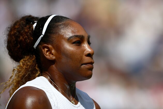 US player Serena Williams looks on as she plays Czech Republic's Barbora Strycova during their women's singles semi-final match on day ten of the 2019 Wimbledon Championships at The All England Lawn Tennis Club in Wimbledon, southwest London, on July 11, 2019. (Photo by HANNAH MCKAY / POOL / AFP) / RESTRICTED TO EDITORIAL USE        (Photo credit should read HANNAH MCKAY/AFP/Getty Images)