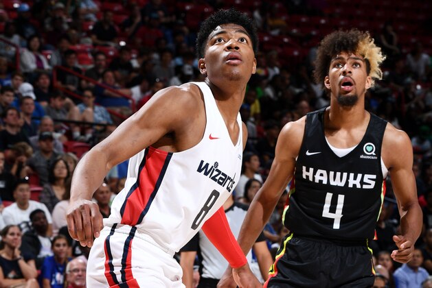 LAS VEGAS, NV - JULY 11: Rui Hachimura #8 of the Washington Wizards boxes out Charles Brown #4 of the Atlanta Hawks  on July 11, 2019 at the Thomas & Mack Center in Las Vegas, Nevada. NOTE TO USER: User expressly acknowledges and agrees that, by downloading and/or using this photograph, user is consenting to the terms and conditions of the Getty Images License Agreement. Mandatory Copyright Notice: Copyright 2019 NBAE (Photo by Garrett Ellwood/NBAE via Getty Images)