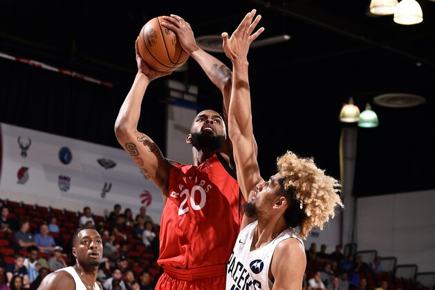 Las Vegas, NV - JULY 11: Dewan Hernandez #20 of the Toronto Raptors shoots the ball during the game against the Indiana Pacers during Day 7 of the 2019 Las Vegas Summer League on July 11, 2019 at the Cox Pavilion in Las Vegas, Nevada. NOTE TO USER: User expressly acknowledges and agrees that, by downloading and or using this Photograph, user is consenting to the terms and conditions of the Getty Images License Agreement. Mandatory Copyright Notice: Copyright 2019 NBAE (Photo by David Dow/NBAE via Getty Images)