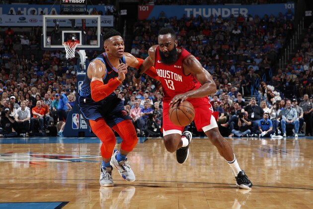 OKLAHOMA CITY, OK - APRIL 9: James Harden #13 of the Houston Rockets drives past Russell Westbrook #0 of the Oklahoma City Thunder on April 9, 2019 at Chesapeake Energy Arena in Oklahoma City, OK. NOTE TO USER: User expressly acknowledges and agrees that, by downloading and or using this photograph, User is consenting to the terms and conditions of the Getty Images License Agreement. Mandatory Copyright Notice: Copyright 2019 NBAE (Photo by Jeff Haynes/NBAE via Getty Images)