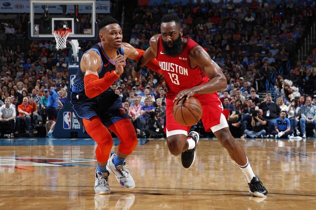 OKLAHOMA CITY, OK - APRIL 9: James Harden #13 of the Houston Rockets drives past Russell Westbrook #0 of the Oklahoma City Thunder on April 9, 2019 at Chesapeake Energy Arena in Oklahoma City, OK. NOTE TO USER: User expressly acknowledges and agrees that, by downloading and or using this photograph, User is consenting to the terms and conditions of the Getty Images License Agreement. Mandatory Copyright Notice: Copyright 2019 NBAE (Photo by Jeff Haynes/NBAE via Getty Images)