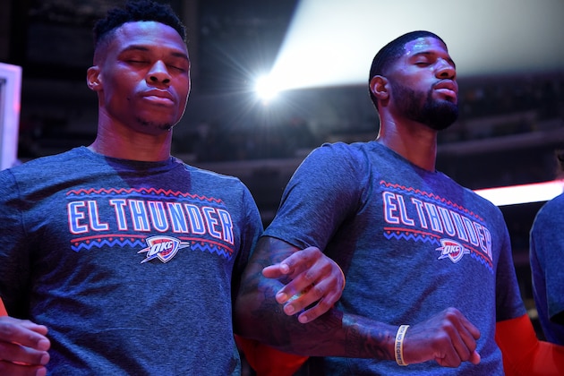 LOS ANGELES, CA - MARCH 8: Russell Westbrook #0 and Paul George #13 of the Oklahoma City Thunder stand for the National Anthem before the game against the LA Clippers on March 8, 2019 at STAPLES Center in Los Angeles, California. NOTE TO USER: User expressly acknowledges and agrees that, by downloading and/or using this photograph, user is consenting to the terms and conditions of the Getty Images License Agreement. Mandatory Copyright Notice: Copyright 2019 NBAE (Photo by Andrew D. Bernstein/NBAE via Getty Images) LOS ANGELES, CA - MARCH 8: Russell Westbrook #0 and Paul George #13 of the Oklahoma City Thunder stand for the National Anthem before the game against the LA Clippers on March 8, 2019 at STAPLES Center in Los Angeles, California. NOTE TO USER: User expressly acknowledges and agrees that, by downloading and/or using this photograph, user is consenting to the terms and conditions of the Getty Images License Agreement. Mandatory Copyright Notice: Copyright 2019 NBAE (Photo by Andrew D. Bernstein/NBAE via Getty Images)
