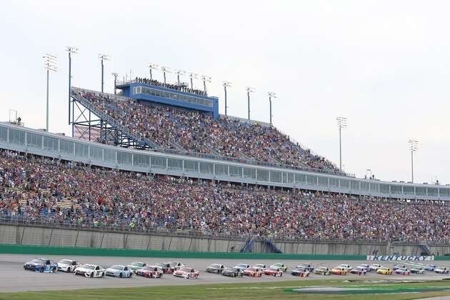 SPARTA, KY - JULY 14:  Martin Truex Jr., driver of the #78 Auto-Owners Insurance Toyota, leads the field to start the Monster Energy NASCAR Cup Series Quaker State 400 presented by Walmart at Kentucky Speedway on July 14, 2018 in Sparta, Kentucky.  (Photo by Jerry Markland/Getty Images)