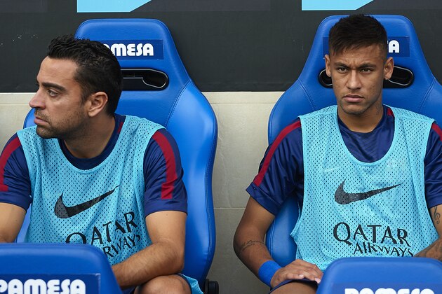 VILLARREAL, SPAIN - AUGUST 31:  Neymar Jr (R) and Xavi of Barcelona sit on the bench prior to the La Liga match between Villarreal CF and FC Barcelona at El Madrigal stadium on August 31, 2014 in Villarreal, Spain.  (Photo by Manuel Queimadelos Alonso/Getty Images)