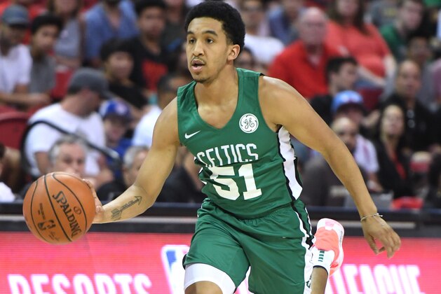 LAS VEGAS, NEVADA - JULY 11:  Tremont Waters #51 of the Boston Celtics brings the ball up the court against the Memphis Grizzlies during the 2019 NBA Summer League at the Thomas & Mack Center on July 11, 2019 in Las Vegas, Nevada. The Celtics defeated the Grizzlies 113-87. NOTE TO USER: User expressly acknowledges and agrees that, by downloading and or using this photograph, User is consenting to the terms and conditions of the Getty Images License Agreement.  (Photo by Ethan Miller/Getty Images)