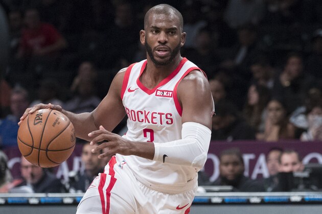 Houston Rockets guard Chris Paul handles the ball during the first half of an NBA basketball game against the Brooklyn Nets, Friday, Nov. 2, 2018, in New York. (AP Photo/Mary Altaffer)