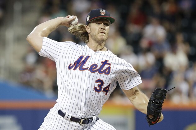 New York Mets' Noah Syndergaard delivers a pitch during the first inning of a baseball game against the Philadelphia Phillies Saturday, July 6, 2019, in New York. (AP Photo/Frank Franklin II)