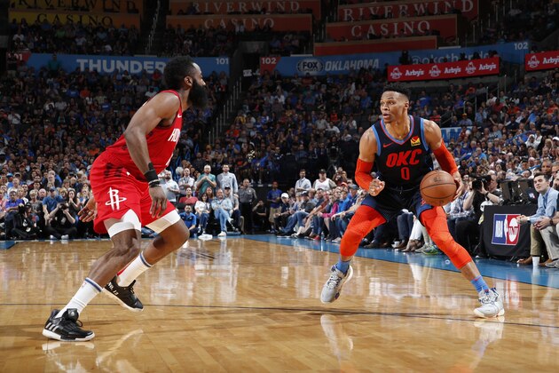 OKLAHOMA CITY, OK - APRIL 9: Russell Westbrook #0 of the Oklahoma City Thunder handles the ball during the game against James Harden #13 of the Houston Rockets on April 9, 2019 at Chesapeake Energy Arena in Oklahoma City, OK. NOTE TO USER: User expressly acknowledges and agrees that, by downloading and or using this photograph, User is consenting to the terms and conditions of the Getty Images License Agreement. Mandatory Copyright Notice: Copyright 2019 NBAE (Photo by Jeff Haynes/NBAE via Getty Images)