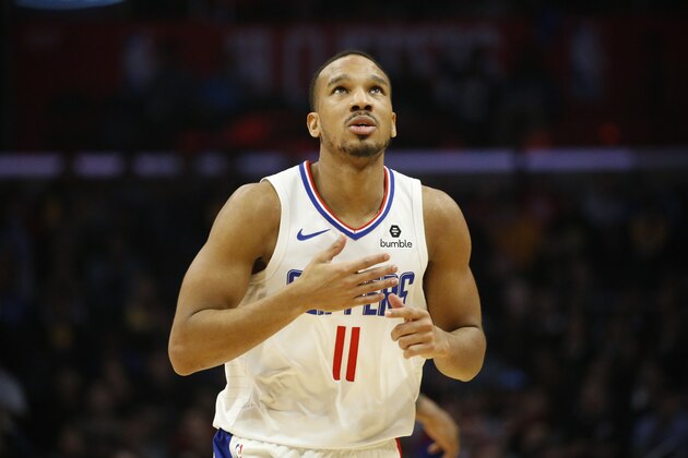 Los Angeles Clippers' Avery Bradley (11) celebrates after making a 3-pointer during an NBA basketball game between Los Angeles Clippers and New Orleans Pelicans Monday, Jan. 14, 2019, in Los Angeles. The Pelicans won 121-117. (AP Photo/Ringo H.W. Chiu)