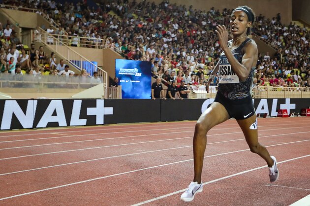 Netherland's Sifan Hassan reacts as she crosses the finish line, wins the Women's 1 mile and break the world record in the discipline during the IAAF Diamond League competition on July 12, 2019 in Monaco. (Photo by Valery HACHE / AFP)        (Photo credit should read VALERY HACHE/AFP/Getty Images)