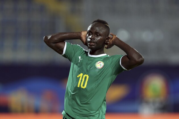 Senegal's Sadio Mane reacts after missing a chance to score during the African Cup of Nations group D soccer match between Kenya and Senegal in 30 June Stadium in Cairo, Egypt, Monday, July 1, 2019. (AP Photo/Hassan Ammar)