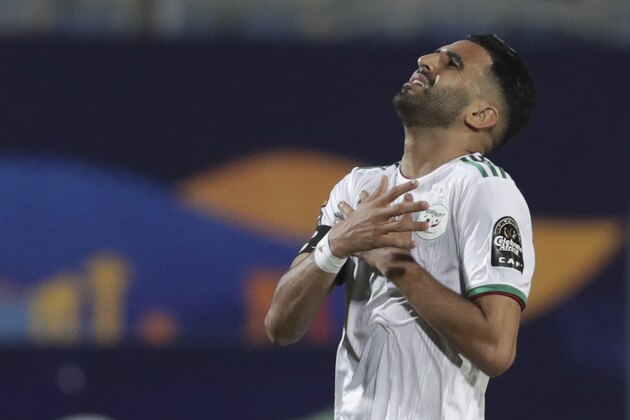 Algeria's Riyad Mahrez reacts after a missed scoring opportunity during the African Cup of Nations group C soccer match between Algeria and Kenya at 30 June Stadium in Cairo, Egypt, Sunday, June 23, 2019. (AP Photo/Hassan Ammar)
