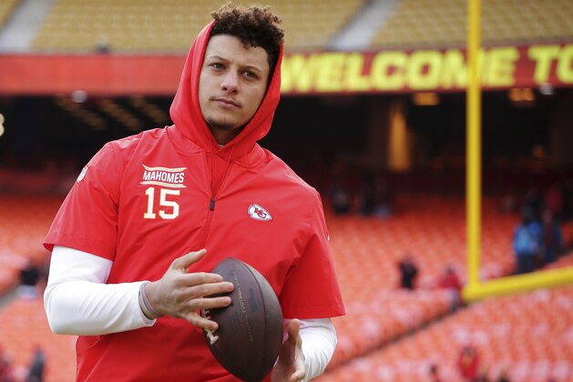 Kansas City Chiefs quarterback Patrick Mahomes warms up before the AFC Championship NFL football game against the New England Patriots, Sunday, Jan. 20, 2019, in Kansas City, Mo. (AP Photo/Charlie Riedel)