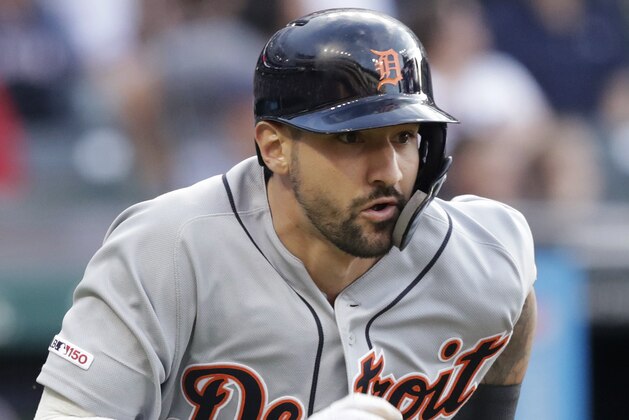 Detroit Tigers' Nicholas Castellanos heads toward first with an RBI double during the third inning of the team's baseball game against the Cleveland Indians, Friday, June 21, 2019, in Cleveland. (AP Photo/Tony Dejak)