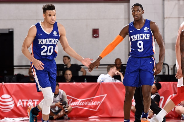 LAS VEGAS, NV - JULY 13: Kevin Knox #20 and RJ Barrett #9 of the New York Knicks hi-five  on July 13, 2019 at the Cox Pavilion in Las Vegas, Nevada. NOTE TO USER: User expressly acknowledges and agrees that, by downloading and/or using this photograph, user is consenting to the terms and conditions of the Getty Images License Agreement. Mandatory Copyright Notice: Copyright 2019 NBAE (Photo by David Dow/NBAE via Getty Images)