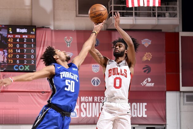 LAS VEGAS, NV - JULY 13: Coby White #0 of the Chicago Bulls shoots the ball against the Orlando Magic on July 13, 2019 at the Cox Pavilion in Las Vegas, Nevada. NOTE TO USER: User expressly acknowledges and agrees that, by downloading and/or using this photograph, user is consenting to the terms and conditions of the Getty Images License Agreement. Mandatory Copyright Notice: Copyright 2019 NBAE (Photo by David Dow/NBAE via Getty Images)