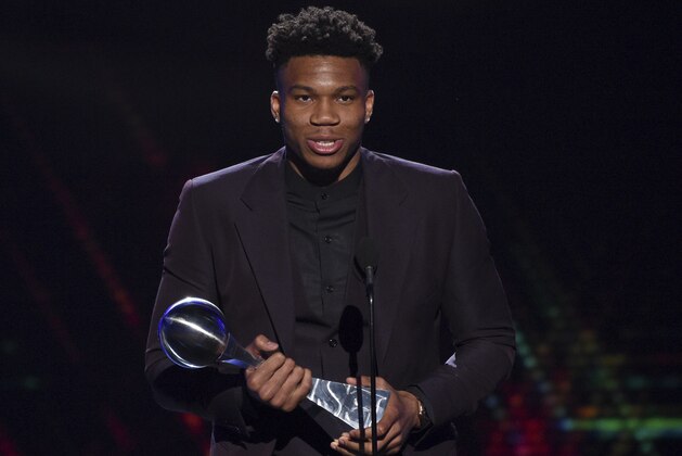 NBA player Giannis Antetokounmpo, of the Milwaukee Bucks, accepts the award for best male athlete at the ESPY Awards on Wednesday, July 10, 2019, at the Microsoft Theater in Los Angeles. (Photo by Chris Pizzello/Invision/AP)