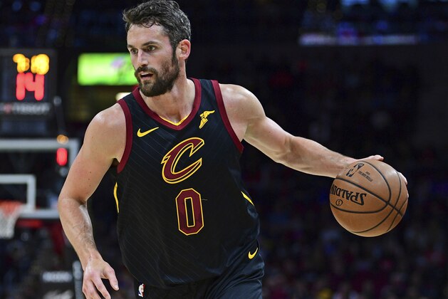 Cleveland Cavaliers forward Kevin Love dribbles in the first half of an NBA basketball game against the Los Angeles Clippers, Friday, March 22, 2019, in Cleveland.The Clippers won 110-108. (AP Photo/David Dermer)