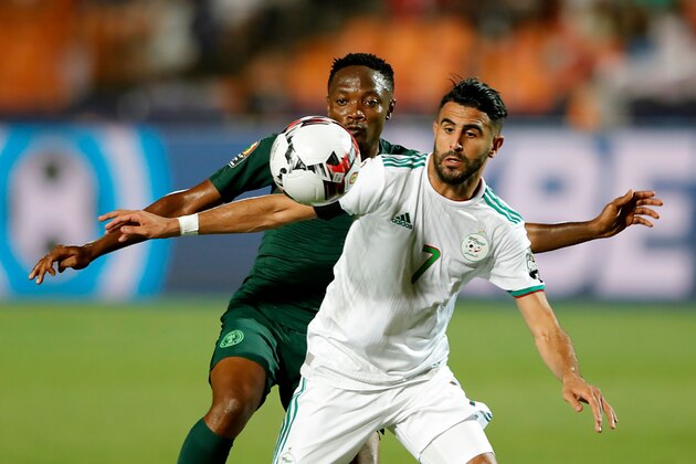 Algeria's forward Riyad Mahrez (R) vies for the ball with Nigeria's forward Ahmed Musa during the 2019 Africa Cup of Nations (CAN) Semi-final football match between Algeria and Nigeria at the Cairo International stadium in Cairo on July 14, 2019. (Photo by FADEL SENNA / AFP)        (Photo credit should read FADEL SENNA/AFP/Getty Images)