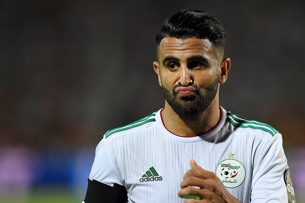 Algeria's forward Riyad Mahrez reacts during the 2019 Africa Cup of Nations (CAN) Semi-final football match between Algeria and Nigeria at the Cairo International stadium in Cairo on July 14, 2019. (Photo by MOHAMED EL-SHAHED / AFP)        (Photo credit should read MOHAMED EL-SHAHED/AFP/Getty Images)