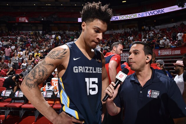 LAS VEGAS, NV - JULY 14: Brandon Clarke #15 of the Memphis Grizzlies speaks to Jorge Sedano after the Semifinals of the Las Vegas Summer League against the New Orleans Pelicans on July 14, 2019 at the Thomas & Mack Center in Las Vegas, Nevada. NOTE TO USER: User expressly acknowledges and agrees that, by downloading and/or using this photograph, user is consenting to the terms and conditions of the Getty Images License Agreement. Mandatory Copyright Notice: Copyright 2019 NBAE (Photo by David Dow/NBAE via Getty Images)