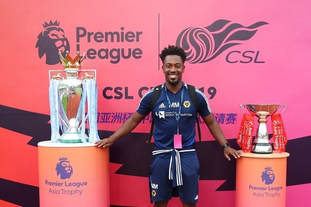 NANJING, CHINA - JULY 15:  Marc McLaren of Wolves taking a photo with the Premier League trophy during the finals the of CSL Cup Youth Tournament match between Jiangsu Suning and Shanghai Shenhua at Jiangsu FA Training Complex on July 15, 2019 in Nanjing, China.  (Photo by Lintao Zhang/Getty Images for Premier League)