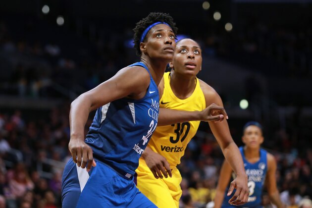 LOS ANGELES, CA - JUNE 03: Sylvia Fowles #34 of the Minnesota Lynx boxing out during free throws against Nneka Ogwumike #30 of the Los Angeles Sparks during a WNBA basketball game at Staples Center on June 3, 2018 in Los Angeles, California.  (Photo by Leon Bennett/Getty Images)