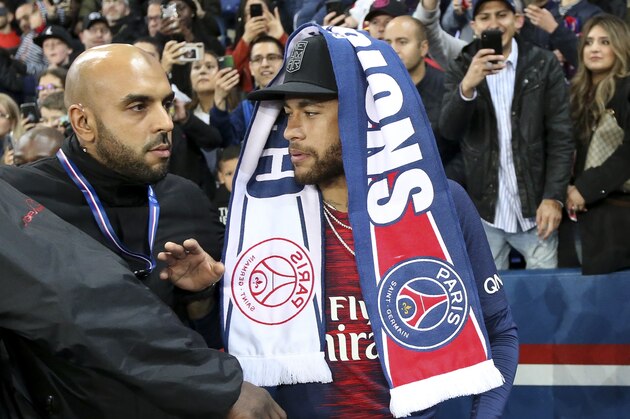 PARIS, FRANCE - MAY 18: Neymar Jr of PSG celebrates winning the 'French Championship 2018-2019' during the trophy ceremony following the French Ligue 1 match between Paris Saint-Germain and Dijon FCO at Parc des Princes stadium on May 18, 2019 in Paris, France. (Photo by Jean Catuffe/Getty Images)