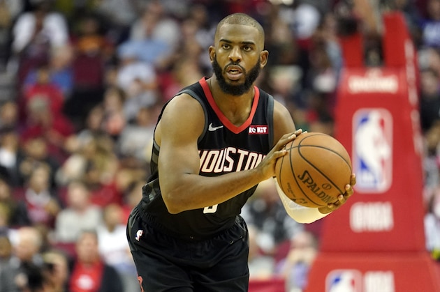 Houston Rockets' Chris Paul looks to pass the ball against the Philadelphia 76ers during the second half of an NBA basketball game Friday, March 8, 2019, in Houston. (AP Photo/David J. Phillip)