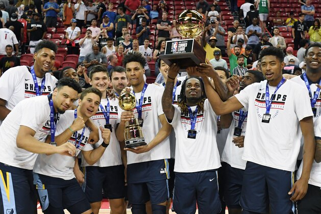 LAS VEGAS, NEVADA - JULY 15:  The Memphis Grizzlies celebrate the team's 95-92 victory over the Minnesota Timberwolves to win the championship game of the 2019 NBA Summer League at the Thomas & Mack Center on July 15, 2019 in Las Vegas, Nevada. NOTE TO USER: User expressly acknowledges and agrees that, by downloading and or using this photograph, User is consenting to the terms and conditions of the Getty Images License Agreement.  (Photo by Ethan Miller/Getty Images)