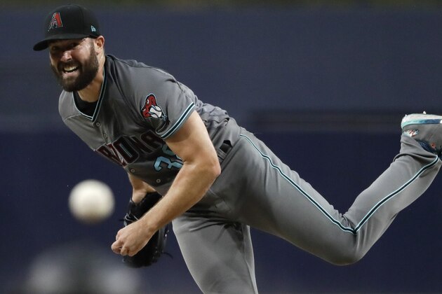 Arizona Diamondbacks starting pitcher Robbie Ray works against a San Diego Padres batter during the first inning of a baseball game Friday, Aug. 17, 2018, in San Diego. (AP Photo/Gregory Bull)