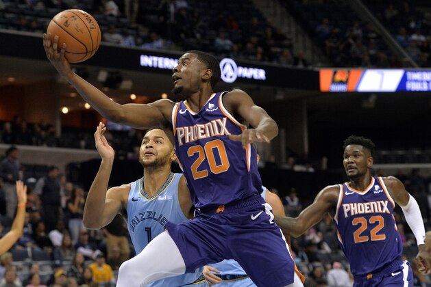 Phoenix Suns forward Josh Jackson (20) shoots against Memphis Grizzlies forward Kyle Anderson (1) in the first half of an NBA basketball game Saturday, Oct. 27, 2018, in Memphis, Tenn. (AP Photo/Brandon Dill)
