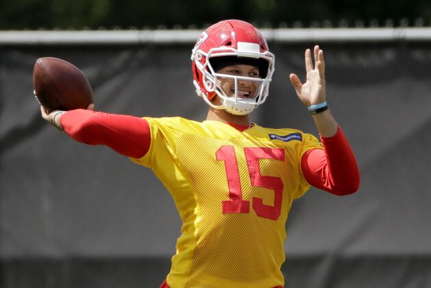 Kansas City Chiefs quarterback Patrick Mahomes (15) throws during a workout at their NFL football training facility Wednesday, June 12, 2019, in Kansas City, Mo. (AP Photo/Charlie Riedel)