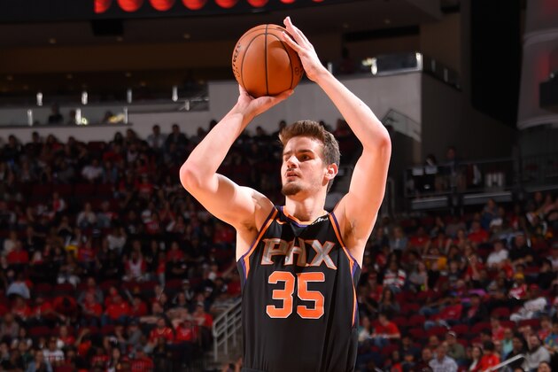 HOUSTON, TX - APRIL 7: Dragan Bender #35 of the Phoenix Suns shoots the ball against the Houston Rockets on April 7, 2019 at the Toyota Center in Houston, Texas. NOTE TO USER: User expressly acknowledges and agrees that, by downloading and/or using this photograph, user is consenting to the terms and conditions of the Getty Images License Agreement. Mandatory Copyright Notice: Copyright 2019 NBAE (Photo by Bill Baptist/NBAE via Getty Images)